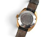 an image of a close up of a watch on a white surface
