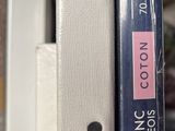 two books on a shelf next to each other