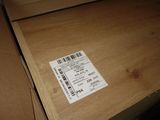 a box with a ticket sitting on top of it