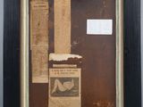 an old picture of a picture of a newspaper on a wall