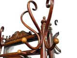 a coat rack with a mirror and a pair of umbrellas hanging from it
