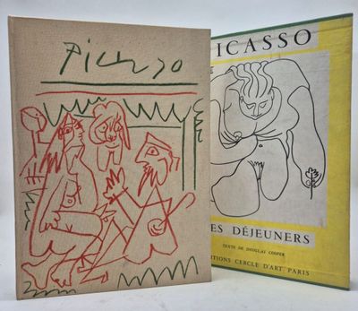 two books with drawings on them sitting next to each other