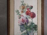 a picture of a painting of flowers on the wall