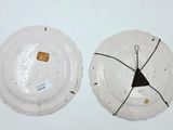 two plates that have been left on the table