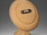 a ring on a stand with a ring in it