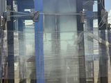 a picture of a blue toilet sitting on a pallet