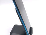 a cell phone that is sitting on a stand