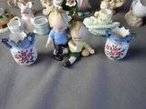 many figurines that are sitting on a table
