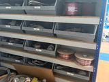 a shelf with many different types of wires in it