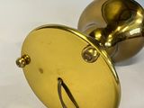 brass plated brass door knob with a metal handle and a brass plated handle