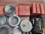 a plastic container filled with many different types of cosmetics