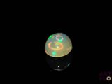 an oplite in the dark with a black background