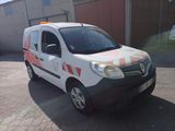 a small white van with a red and white stripe on it