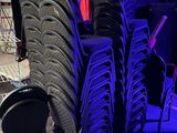 a lot of chairs that are sitting in a room