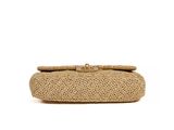 an image of a beige clutch bag on a white background