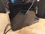 a computer that is sitting on a wooden table