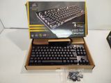 a box that has a keyboard in it on a table