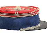 a red and blue hat with a skull and crossbone on it
