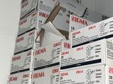 a stack of boxes sitting on top of a shelf