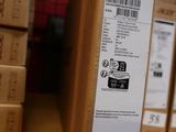 many packages on a shelf in a store
