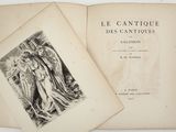 an open book with a drawing of an angel on it