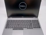 the dell laptop is open and ready to be used
