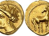 une pièce d'or sur laquelle est représenté un cheval