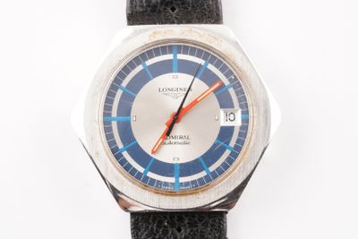 a watch that is sitting on a black leather strap