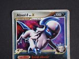 an image of a pokemon card with a picture of a white pokemon