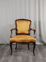 Fauteuil en noyer à dossier cabriolet mouluré sculpté de fle… (photo 2)