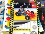 a lot of legos and books on the table