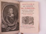 an old book with a picture of a man in armor on it