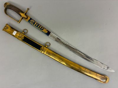 an image of a gold and black sword on a white surface