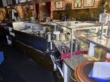 a picture of a restaurant with a lot of counter space