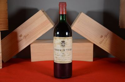 a bottle of wine that is sitting on a table