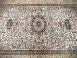 a large oriental rug on the floor in a room