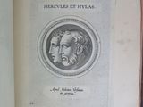 an open book with a drawing of a man ' s face on it