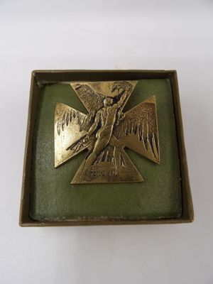 an image of a box with a cross and a bird on it