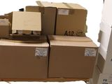 many boxes stacked on top of each other on a pallet