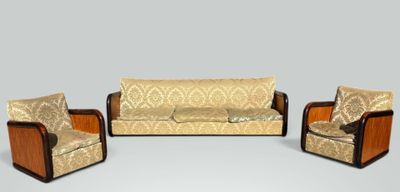 three chairs and a couch in a room
