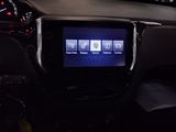 the dashboard of a car with a digital display in the center