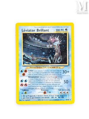 a close up of a pokemon card on a white surface