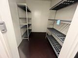 an image of a room with shelves and shelves in it