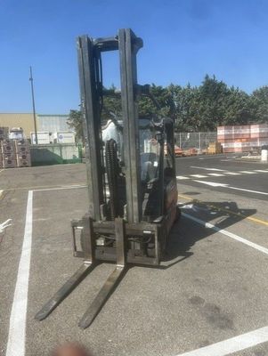 a forklift that is parked in a parking lot