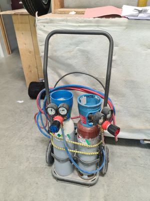 une image d'un chariot de propane contenant une bouteille de propane