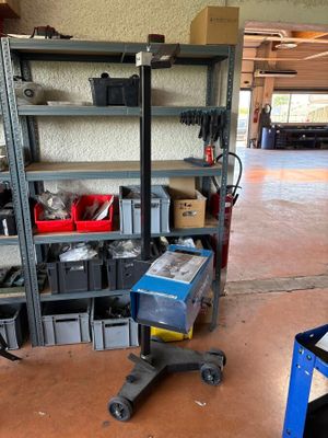 a garage with a lot of tools on the shelves