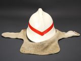 a white fireman ' s hat with a red stripe on it