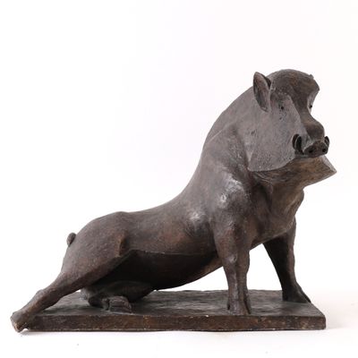 statue of a boar on a wooden base on a white background