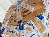 a large cardboard ball that has been wrapped in plastic tape