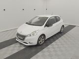 a picture of a white car parked in a garage
